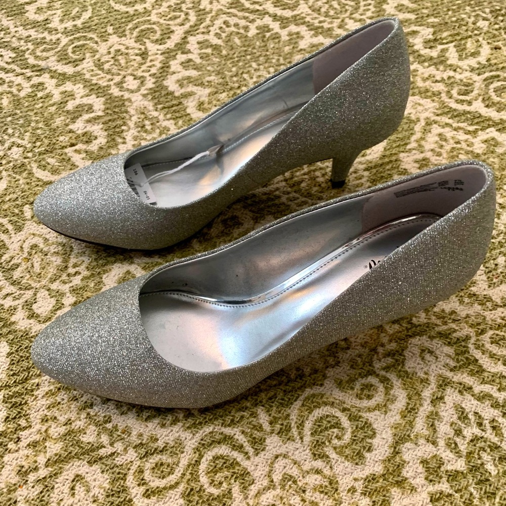 Fioni women’s heels, size 8 1/2. Glittery silver, 2 1/2” heels, padded insole.